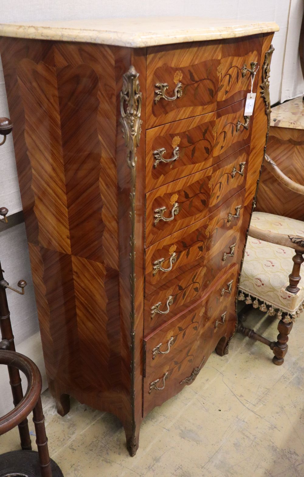 A Louis XV marquetry inlaid marble top serpentine semainier, W.84cm, D.42cm, H.140cm